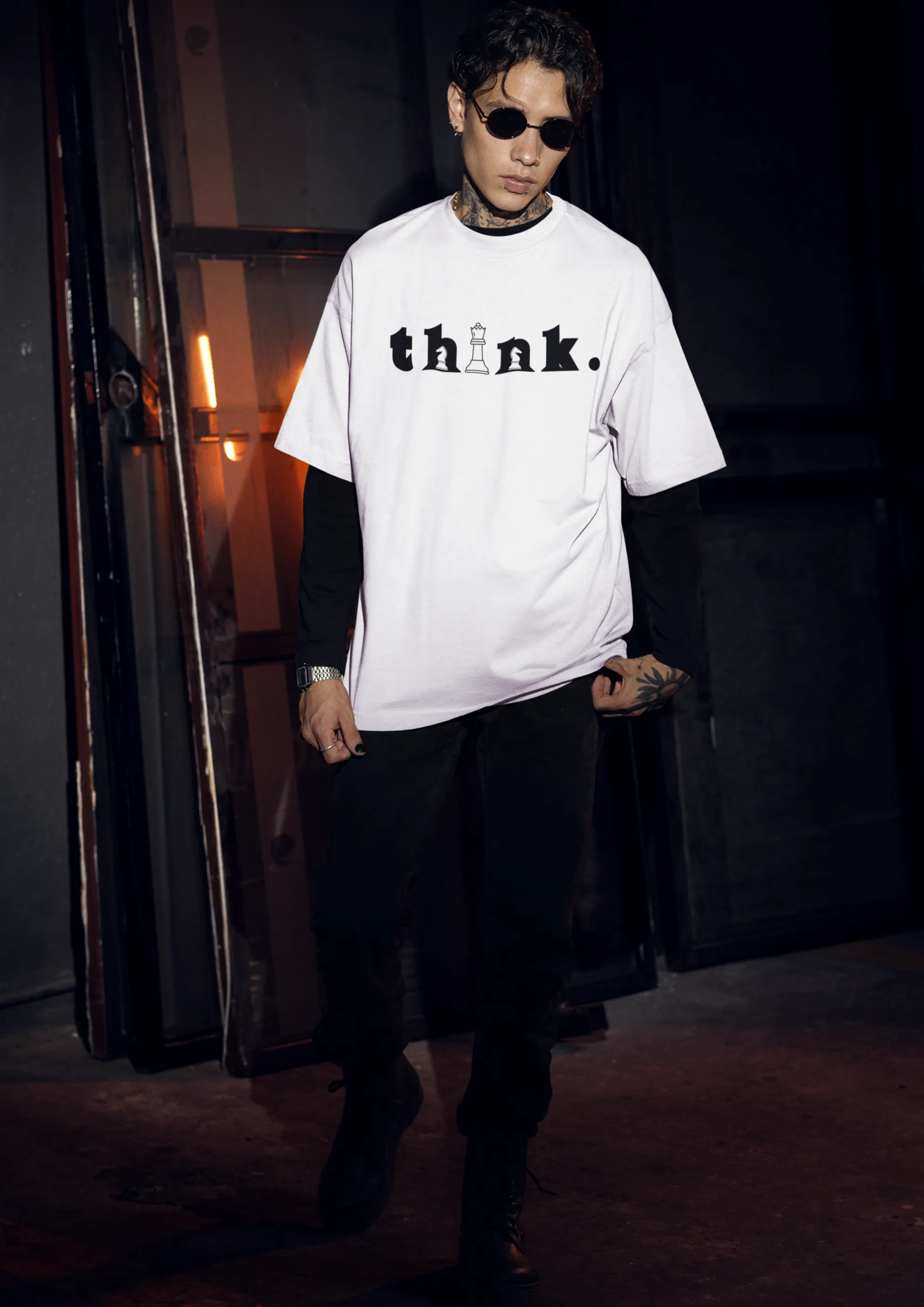Modern Streetwear Look Featuring 'Think' Graphic T-Shirt and Bold Accessories